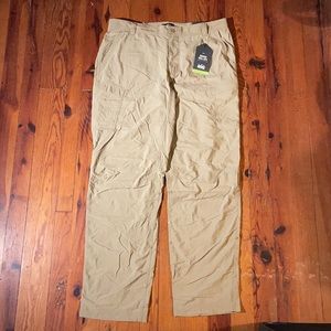 Men’s tan REI Sahara Roll-up pants. Size 38W x 34L.